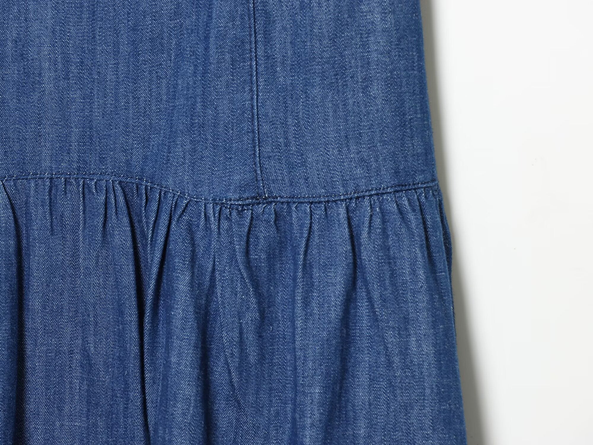 Women's cape style hem sleeveless denim dress